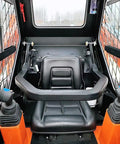 Interior of skid steer loader with Quick Connect System For Skid Steer Attachments That Makes Digging Loading And Hauling A Breeze