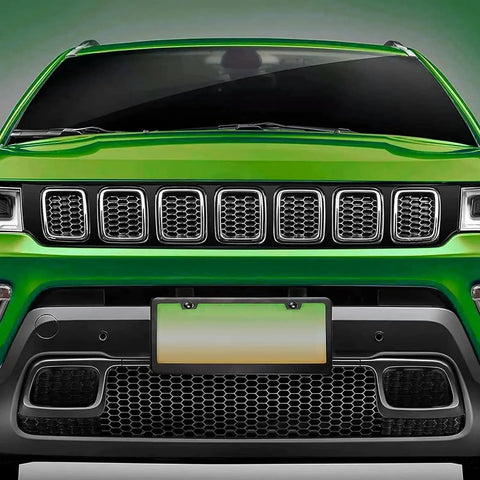 Front view of a green vehicle displaying the Lock Down Rustproof License Plate Screws Kit With Heavy Duty Anti Vibration Bolts And Theft Proof Covers.