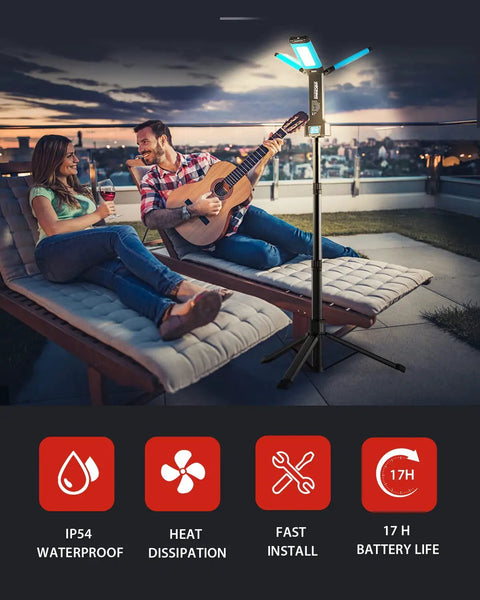 Couple on rooftop with Cordless Rechargeable LED Work Light Kit With Detachable Tripod 8Ah Battery 700 1200 2200 Lumens