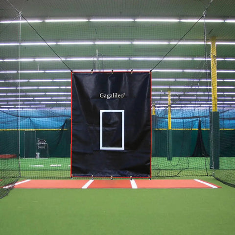 Indoor view of a 6x8Ft Batting Cage Backstop With Heavy Duty Padding And Strike Zone Vinyl Net Protector in a training facility shield.