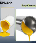Heavy Duty Polished Aluminum Gravity Feed Spray Gun Paint Cup With One Thousand Milliliter Reservoir pouring yellow paint.