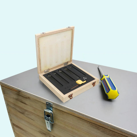 HAowosi metal lathe cutting tools kit in a wooden box with five 3/8-in carbide indexable bits and a small yellow wrench