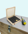 Five Sets Of One Quarter Inch Carbide Lathe Tool Bits For Indexable Turning Metal Lathe Tools in a case with screwdriver nearby.