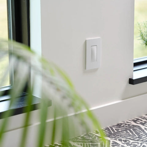 Radiant Smart Home Hub With Netatmo Gateway installed on wall, shown in use with lighting control, white finish