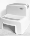 Dual Height Two Step Stool For Kids With Slip Resistant Soft Grip Handles Ideal For Potty Training In The Bathroom Or Kitchen BPA Free Safe Design Durable Toddler Stool For Everyday Use Gray on a white background