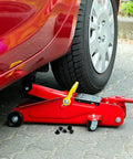 Car raised with jack, shows five pack hydraulic jack oil plugs for floor and bottle jacks flat head reservoir filler plugs rubber bung