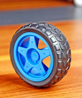 Side view of a light blue wheel from Four Pack 65mm Motor Wheels For Smart Car Chassis And RC Robots Light Blue ABS Rubber Build 4 Pack