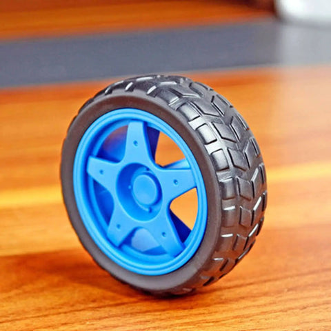 Side view of a light blue wheel from Four Pack 65mm Motor Wheels For Smart Car Chassis And RC Robots Light Blue ABS Rubber Build 4 Pack