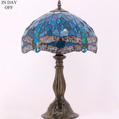 Tiffany Style Stained Glass Dragonfly Table Lamp With Green And Blue Shade, Perfect Reading Light For Your Bedroom Or Living Room Vibe, 12x12x18 Inches, Antique Bronze Base, UL Listed, On Off Cord Switch, S622 Series, showing lamp in off mode with dragonfly motif.