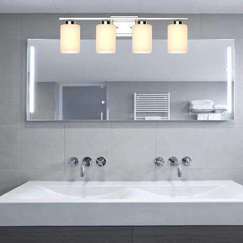 4 Light Brushed Nickel Bathroom Vanity Light Fixture With Frosted Glass Shades Over Mirror Wall Sconce Shown in Modern Bathroom