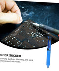 Person using desoldering pen on PCB, part of Desoldering Gun Solder Sucker Pen Set 2 Pack Vacuum Solder Removal Tool For PCBs One Handed Easy To Use No Fuss Desolder Pump For Electronics Repair Great For Rework And Quick Solder Removal In Tight Spots