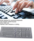 Close-up of hands typing on a keyboard with Top Shelf Pbt Translucent Pudding Keycaps For Mechanical Keyboards Two Tone Injection White Switch Ready 132 Piece Set.