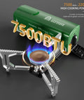 Portable Butane Gas Camping Stove With 7500 BTU Output Ultra Compact Folding Design with visible blue flame and green body