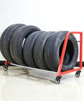 Heavy Duty Wall Mount Wheel Shelf Holds Four Tire Rims Adjustable Garage Storage Rack displaying four tires on a sturdy red frame.