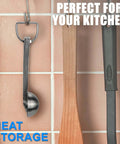 Hanging Must Have Sturdy Stainless Steel Measuring Spoons Set Of 6 With Metric And US Measurements against kitchen wall.