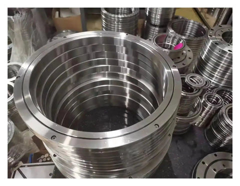 Built Tough Rb50040 Crossed Roller Bearing Packing P2 P4 P5 Precision Specs with multiple steel rings stacked in an industrial setting.
