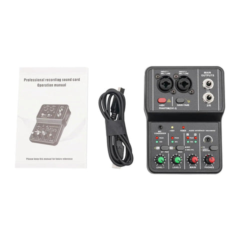 Top view of a Two Channel DJ Mixer For Laptop Tablet And Phone With 16Bit 48KHz Audio Resolution alongside manual and cable.