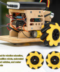 80mm Mecanum Wheel Set For Smart Robot Cars And DIY Projects Omnidirectional Wheels With ABS Rubber 2 Pack Yellow Color Great For Robotics Education Competitions And Maker Builds installed on wooden robotic platform