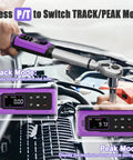 Hands using Digital Torque Wrench With Three Eighths Inch Drive on car engine, LED display showing real-time torque values.