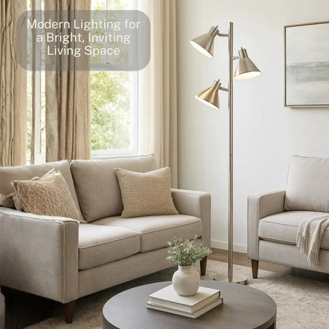 Brushed Nickel Floor Lamp With Three Adjustable Reading Heads in cozy living room, modern 64-inch pole light for comfortable ambiance.