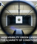 Rechargeable Green Laser Bore Sight Kit With 64 Caliber Adapters For.17 To 12 GA aiming at a target in shooting range