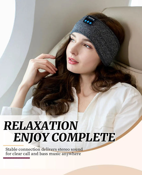 Woman wearing Comfy Sleep Headphones Wireless Headband With Bluetooth 5 Point 4 And Ultra Thin HD Stereo Speakers in grey