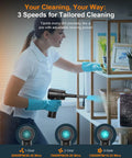 Woman using 11 In 1 Compressed Air Duster With 120000 RPM Adjustable 3 Gear Settings And LED Light for cleaning shelves.