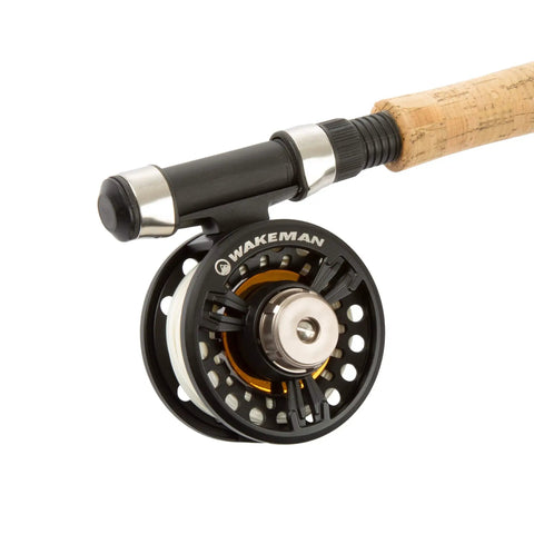 Close-up of reel on Backpacking Ready 3 Piece Fly Fishing Rod And Reel Starter Kit With 97 Inch Collapsible Fiberglass Rod And Cork Handle Case.
