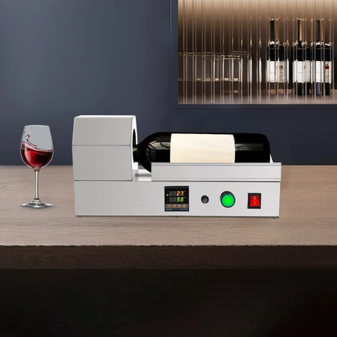 Plug And Play Electric Pvc Bottle Cap Heat Shrinker 110V Tabletop Sealer in stainless steel with wine bottle and glass.