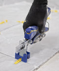 Tile Leveling Pliers Kit For Lash And Xtreme Pro Systems Fully Adjustable Head And Wedge Setting in use on tile surface.
