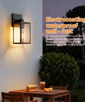 All Season Black Wall Sconces Built Tough To Beat The Elements With Heavy Duty Aluminum And Rainproof Glass E26 Socket Waterproof Exterior Lights For Porches Driveways And Garages Two Pack Set, wall-mounted fixture with glass shade.