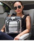Super Heavy Duty ESD Safe Tactical Tool Backpack With Waterproof PVC Mesh Dividers And Clear Organizer Pouches being held by a woman in sunglasses.