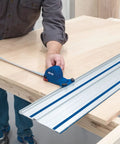 Man using Adaptive Cutting System Parallel Guides For Track Saws ACS415 on plywood for precise straight cuts