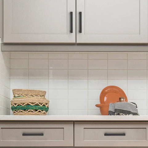 20 Pack 3 Inch Hole Centers Matte Black Cabinet Pulls for Kitchen Cabinets on light wood cabinetry