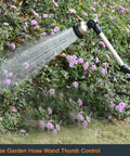 Heavy Duty Metal Garden Hose Wand With 16 Inch Sprayer watering plants in garden