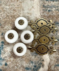Hella Sturdy Retro Ceramic Cabinet Knobs With Backplate Four Pack Vintage Drawer Pulls, four white ceramic knobs with bronze backplates.