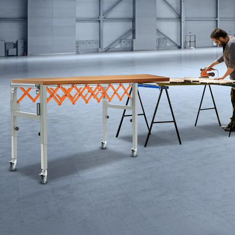 Heavy Duty Adjustable Gravity Roller Table With Rolling Caster Wheels Expandable Extendable Conveyor Belt For Moving Heavy Loads Easy Folding Storage in workshop.