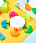 Petals Highlighters Set 140 Pieces In Five Assorted Fluorescent Colors round highlighter pens on desk for study and notes