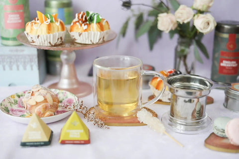 Straight Up Quality Double Walled Glass Tea Cup With Stainless Steel Loose Leaf Infuser Basket And Heatproof Borosilicate Design Solid Eight Ounce Brewing Mug For Every Sip with tea and desserts