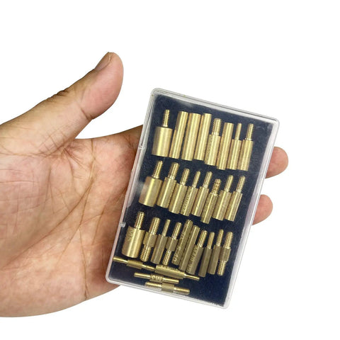 Solid Thirty Piece Gun Cleaning Rod Fitting Adapters With Hella Compatible Threads in hand, showcasing brass thread converters.
