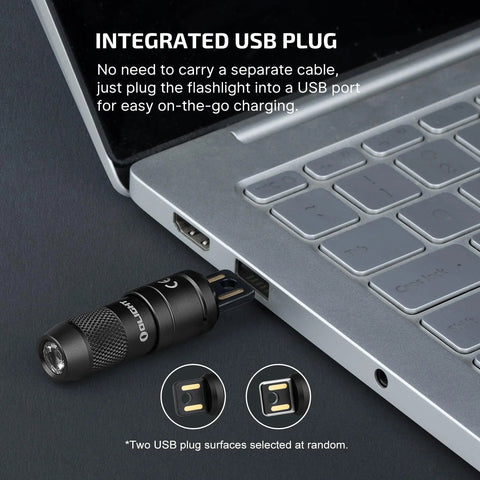 Imini 2 EDC Rechargeable Keychain Flashlight With 50 Lumens Output plugged into USB port for charging
