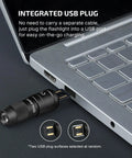 Mini USB Rechargeable Keychain Flashlight With 50 Lumen Output Ultra Compact Portable EDC Light plugged into laptop USB port