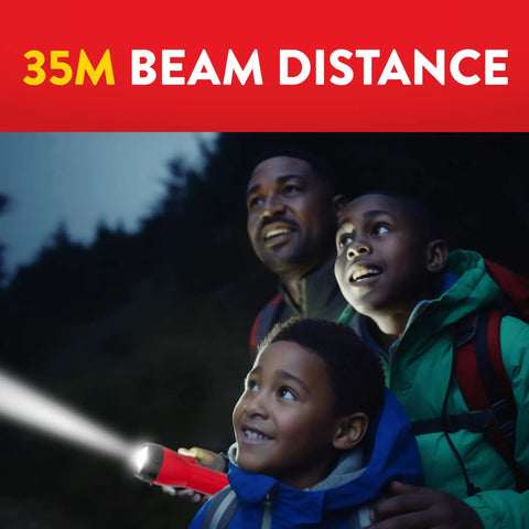 Family using a 3 Pack LED Flashlights For Emergencies And Camping Gear at night, demonstrating 35m beam distance.