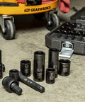 65 Piece 1/2 Inch Drive Impact Socket Set Standard And Deep SAE And MM Off Corner Loading Black Oxide Finish on workshop floor