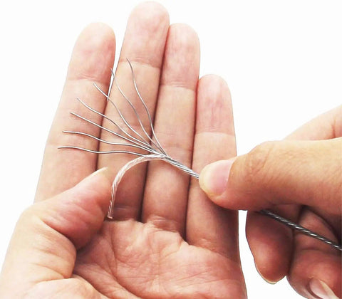 Close-up of braided strands from Heavy Duty Coated Picture Hanging Wire #6, illustrating flexibility and finger-friendly design.