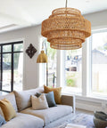 Epic Large Gold Boho Rattan Chandelier With 8 Lights hanging in a bright living room with natural rattan detail, handwoven design.