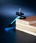Blue T Track Clamps For Woodworking Set Of 4 Hold Down Clamps With 5 Inch Length And T Slot Bolts on wooden boards.
