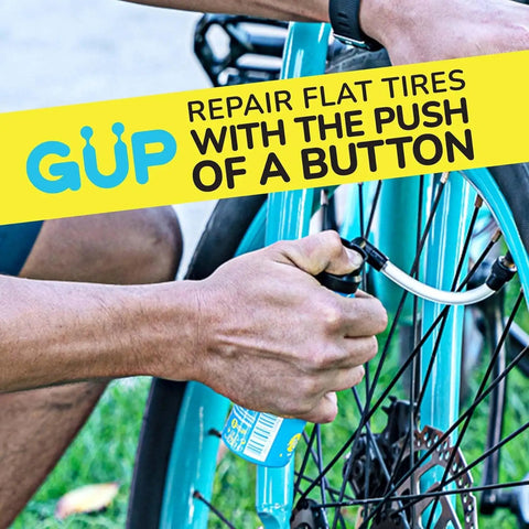 Person using Quick Fix Tire Sealant And Inflator 2 Pack For Tubeless And Tubed Tires on blue bicycle with Schrader valve adapter.