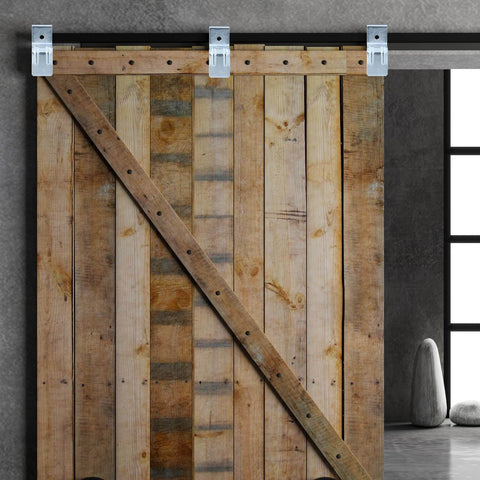 Beefy Heavy Duty Box Rail Hanger Brackets for Barn Doors Set Of Four Galvanized Steel Hardware installed on wooden door