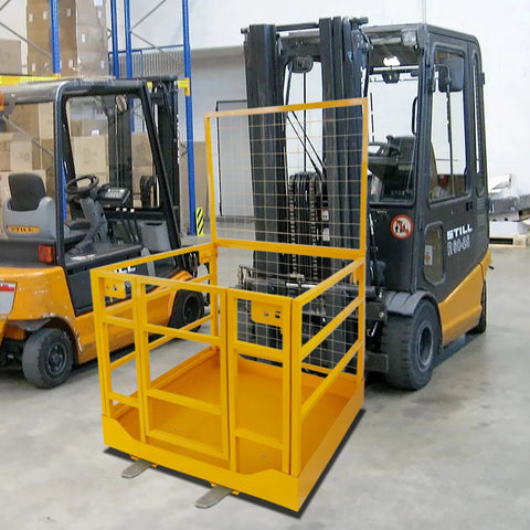 Front view of yellow steel forklift safety cage with guard rails and mesh back panel attached to forklift forks